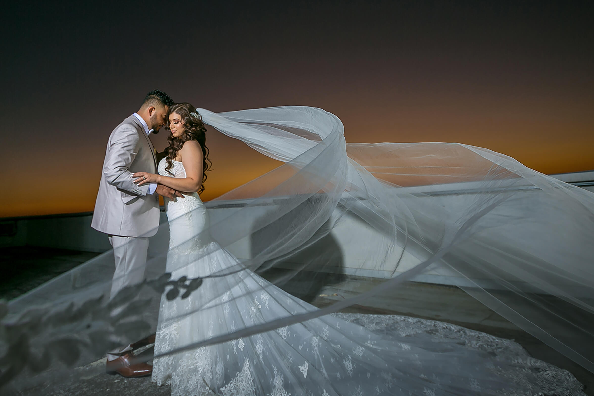 Wedding Photographer Beverly Hills - Sunset rooftop veil wedding photography Los Angeles IMAGE369